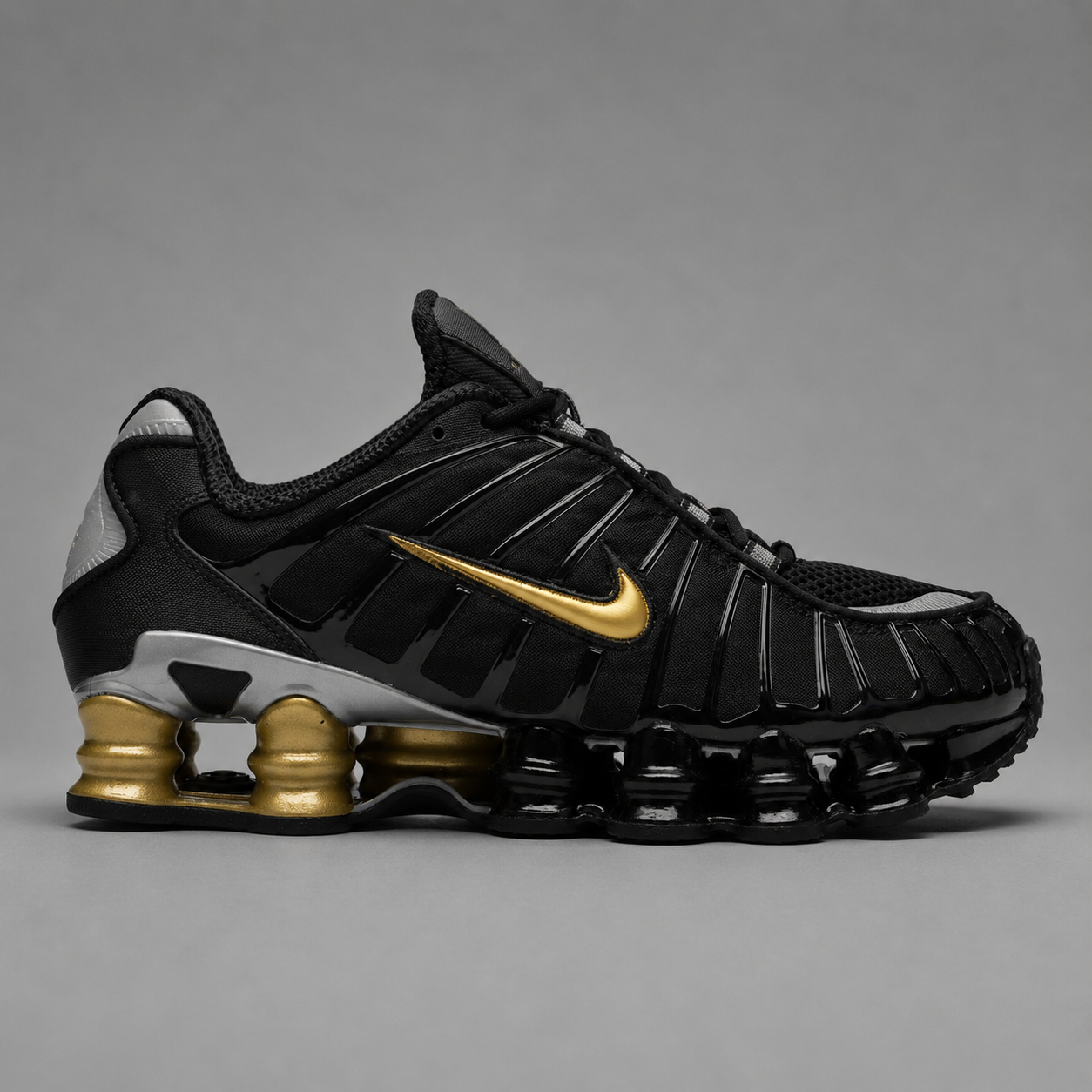 Shox TL Black Gold – Noir / Or / Argent