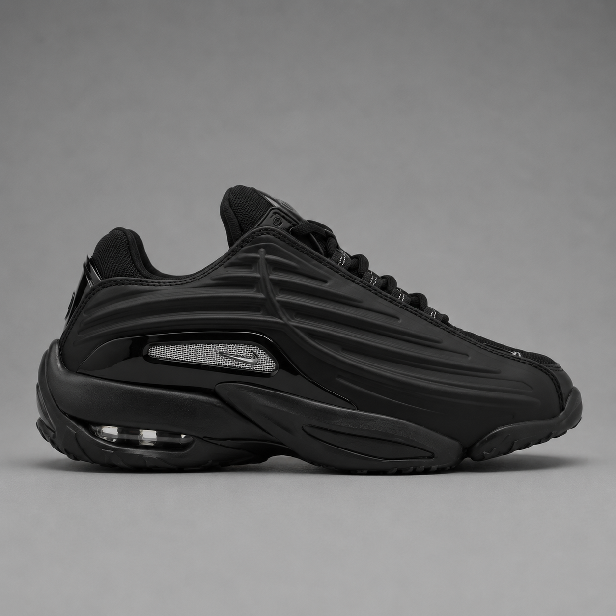 NOCTA Glide Triple Black – Noir Total