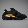NOCTA Glide Black Gold – Noir / Or Métallisé